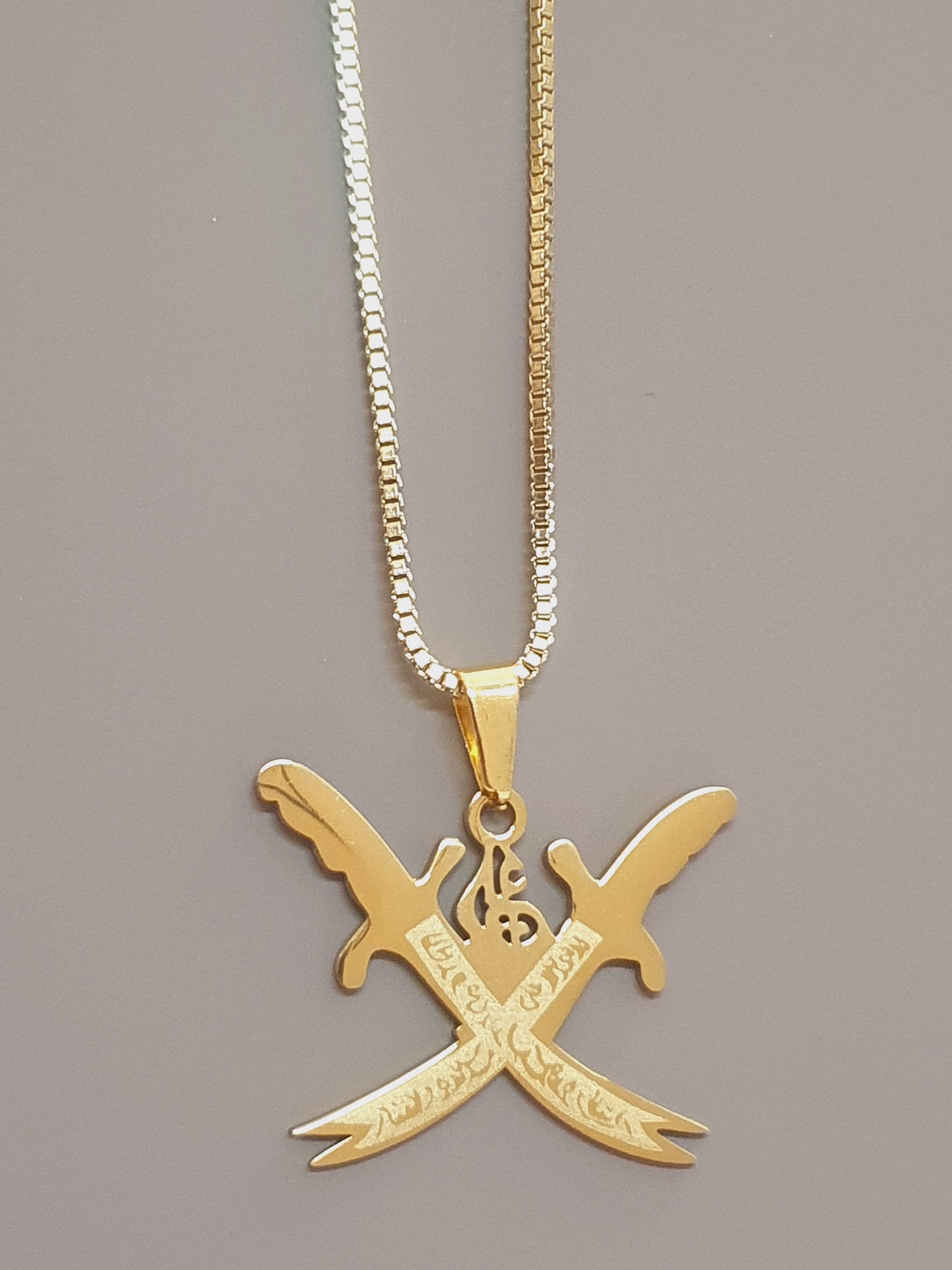 Golden Sword Locket